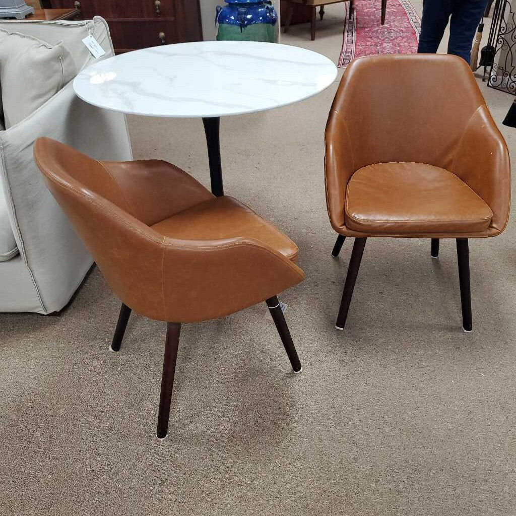 Pair faux leather chairs