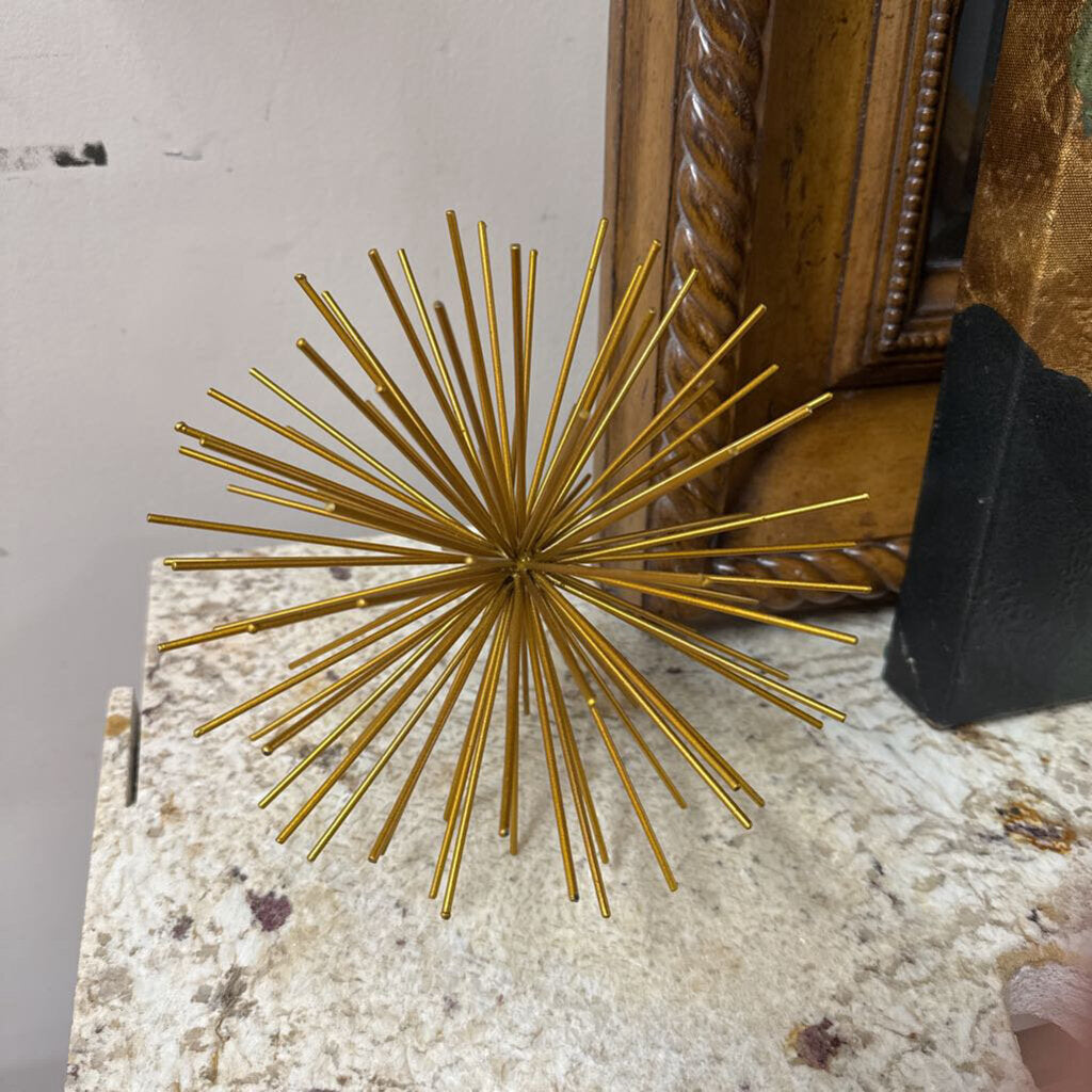 Gold starburst decor