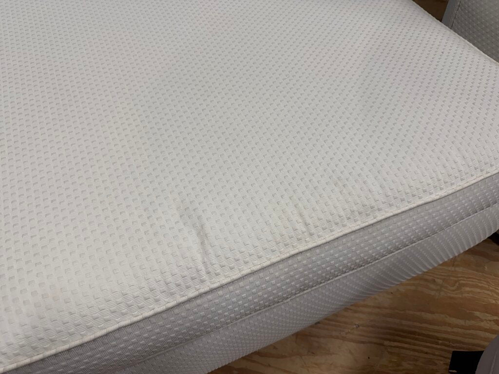 Embossed White Upholstered Ottoman