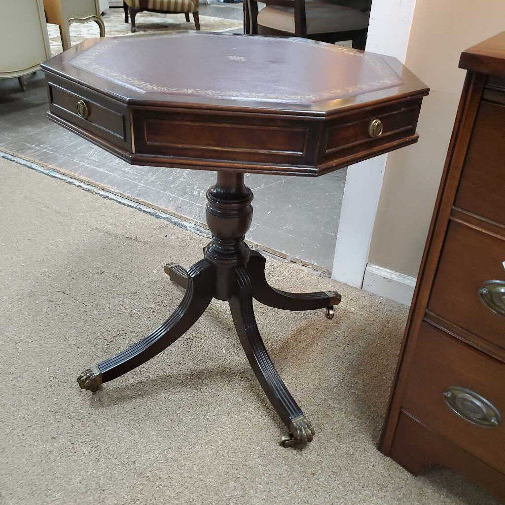 Leather top pedestal table on casters