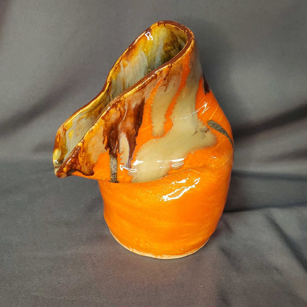 Orange pottery vase