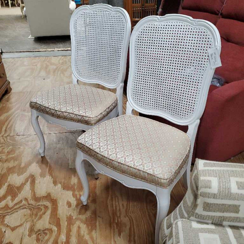 Pair white cane back chairs