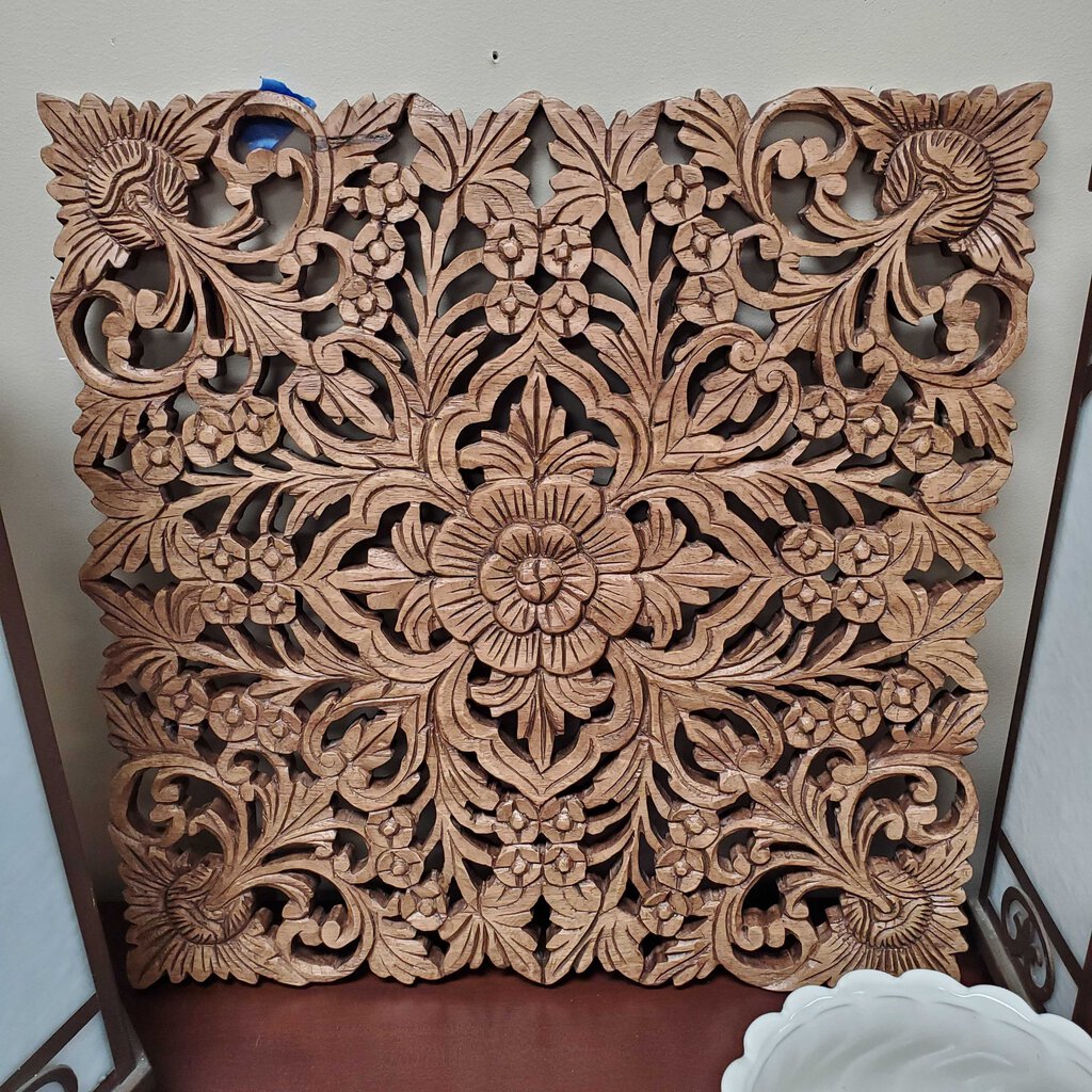 Wood carving wall hanging