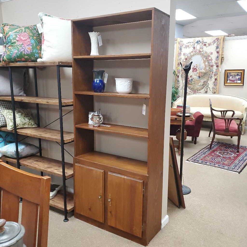 Wood bookcase with cabinet bottom