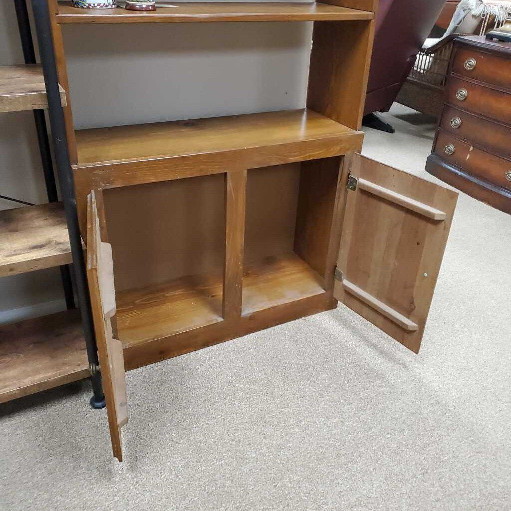 Wood bookcase with cabinet bottom