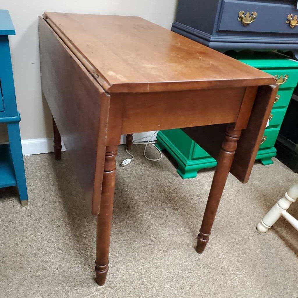 Drop side antique table