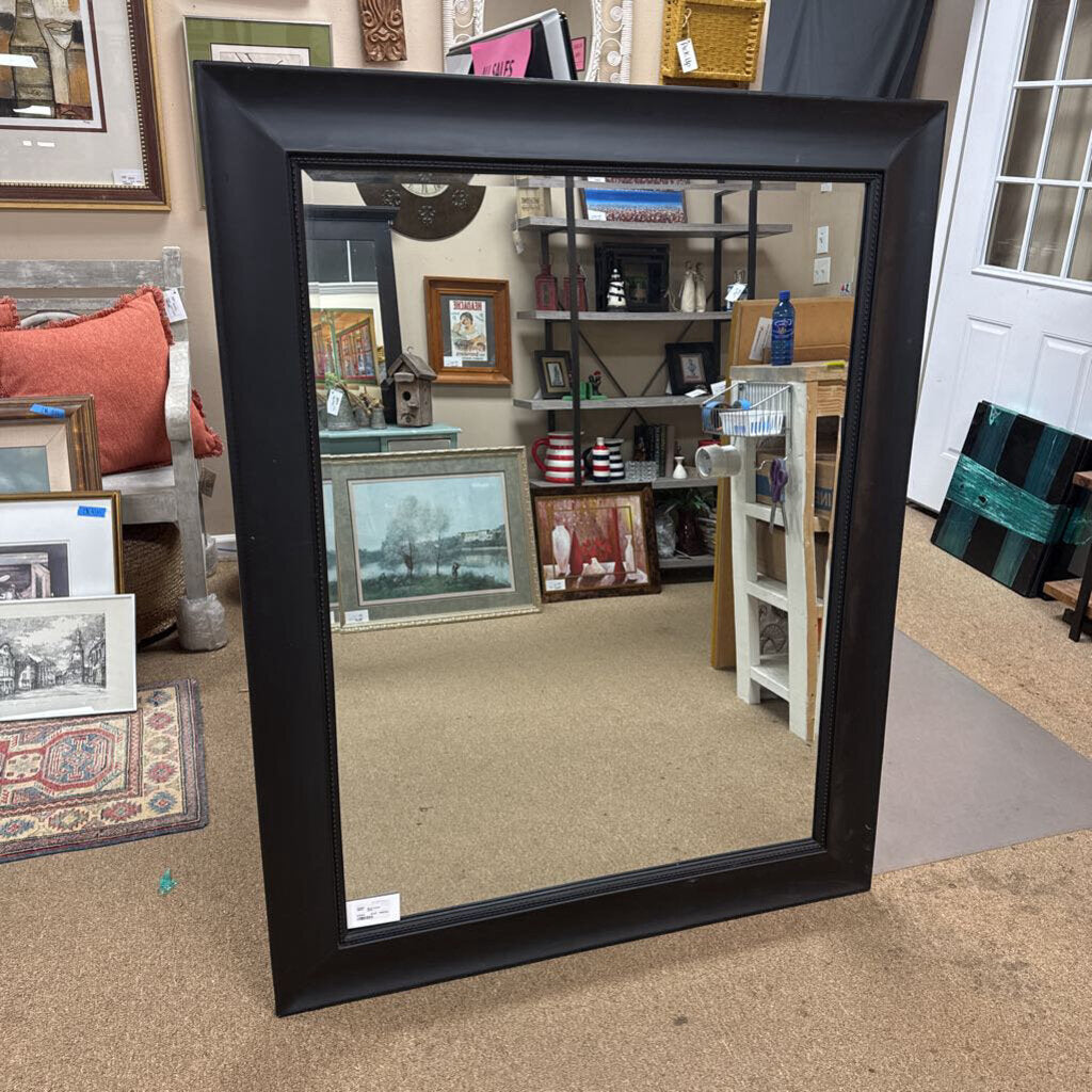 Black framed mirror