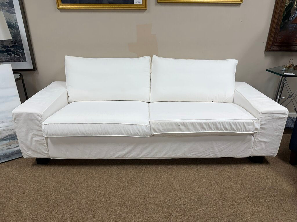 White Slipcovered Sofa