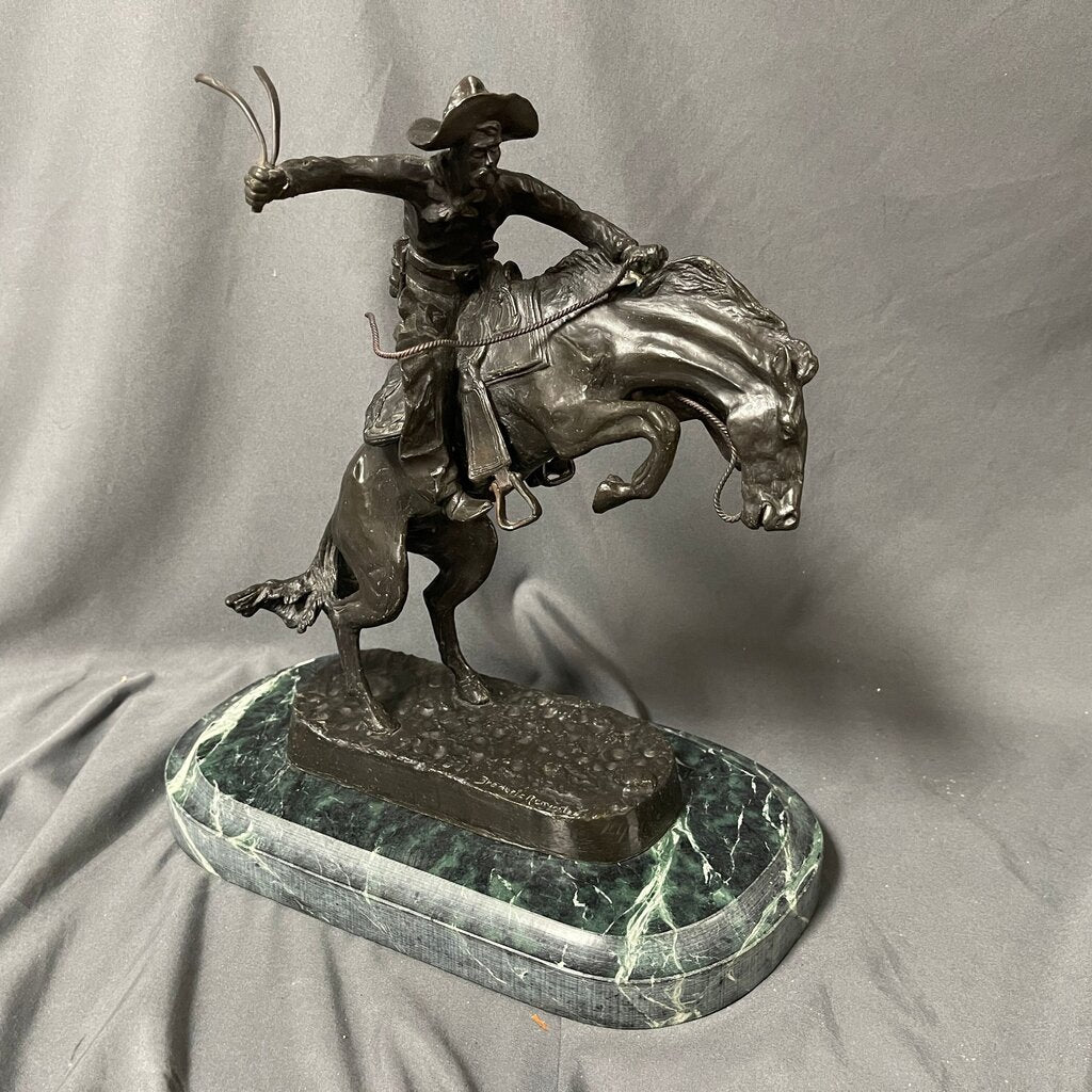 Bronze Cowboy on Horse Statue